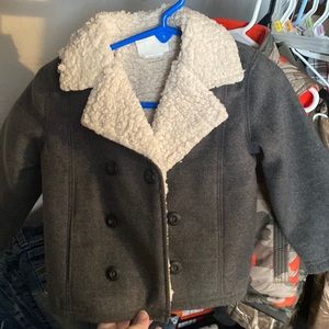 Grey fleece lined jacket.